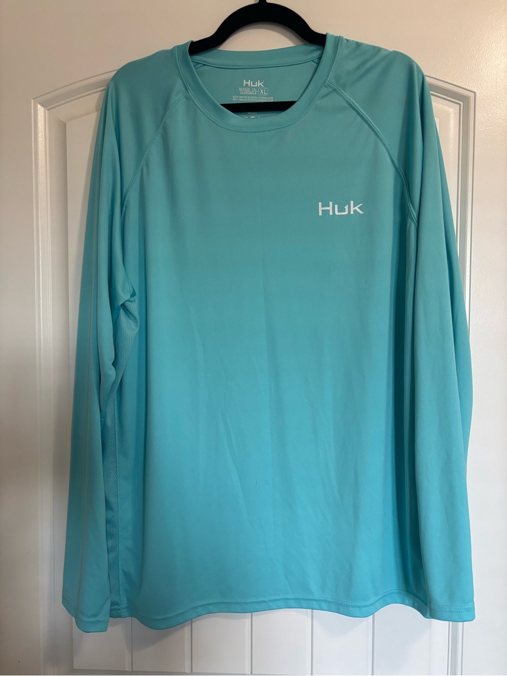 Huk Men’s Long-Sleeve Rash Guard in Aqua Blue